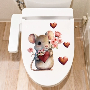 Detailed view of heart and mouse self-adhesive floral decal applied to a toilet lid