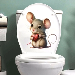 Detailed view of cartoon mouse holding a red heart sticker on a white toilet lid
