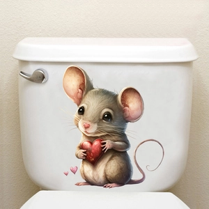 Close-up of a cute mouse with a red heart sticker applied on a white toilet tank