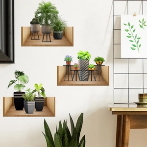 Detail showing 3D wall stickers of green potted plants in realistic wooden niche frames