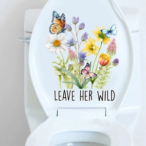 Floral toilet lid sticker featuring colorful wildflowers, butterflies and Leave Her Wild text