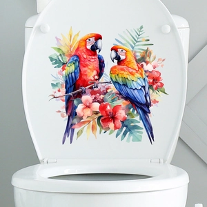Waterproof parrot and floral watercolor sticker applied to a white toilet lid