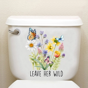 Floral toilet tank decal with white daisies and butterflies featuring Leave Her Wild text