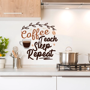 Detail of Coffee Teach Sleep Repeat wall sticker with coffee cup and beans in kitchen