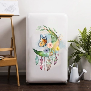 Close-up of a floral moon and butterfly sticker applied to a white retro refrigerator