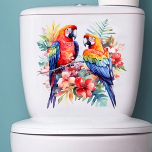 Vibrant watercolor parrot and tropical flower waterproof sticker applied to a toilet tank