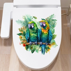 Detail of colorful watercolor parrot and tropical leaf waterproof decal on a toilet lid