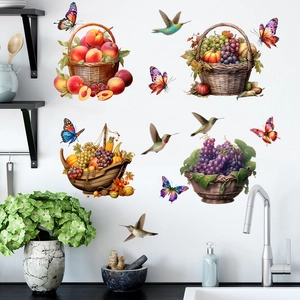 Detail of fruit basket wall stickers with birds and butterflies in a modern kitchen
