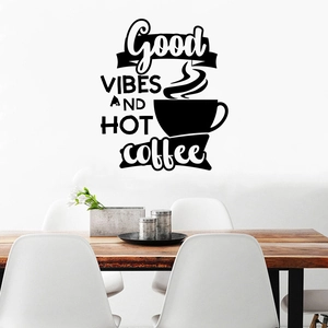 Detail of waterproof coffee wall decal with Good Vibes text on a modern dining room wall