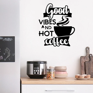 Kitchen wall sticker detail showing Good Vibes and Hot Coffee lettering on white tiles