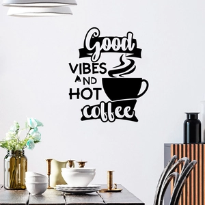 Detailed view of coffee-themed black wall decal on kitchen wall showing good vibes slogan