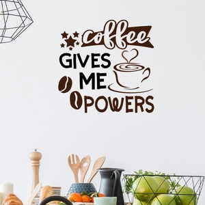 Detail of coffee gives me powers self-adhesive wall decal on white kitchen wall