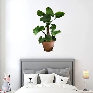 Green leaf wall sticker featuring large heart-shaped tropical plants for home decoration