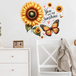 Detail of vibrant sunflower and butterfly wall stickers with You are my Sunshine text
