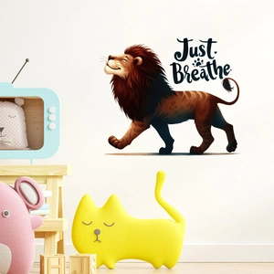 Nursery wall sticker featuring a cartoon lion and Just Breathe quote on a white wall