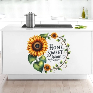 Detail showing sunflower wall stickers with Home Sweet Home text on a kitchen island