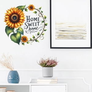 Detail of sunflower wreath wall sticker with Home Sweet Home text on a white living room wall