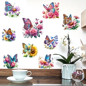 Detail showing vivid sunflower and butterfly wall stickers on a clean white wall surface
