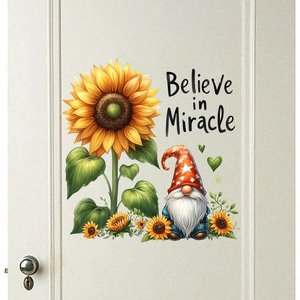 Detail of sunflower and gnome wall sticker with 'Believe in Miracle' text on a door