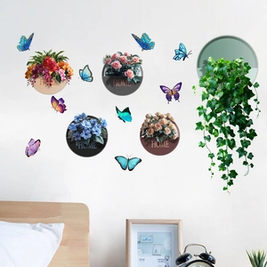 Detail of 3D butterfly stickers and hanging plant wall decals in a modern bedroom setting