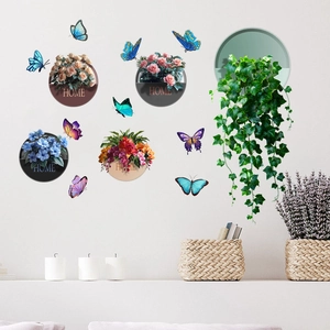 Detail of 3D home plant wall stickers with colorful butterflies on a white wall