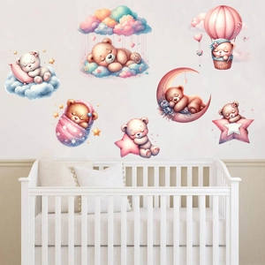 Detail of pink sleepy bear wall stickers with stars and hot air balloon for nursery