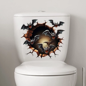 Detail showing 3D bat wall stickers on a ceramic toilet tank for Halloween decor