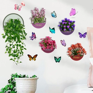 Detail of 3D butterfly stickers and floral Home potted plant wall decals on white wall