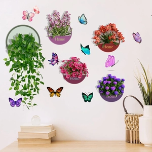 Detail of 3D green plant wall decals with colorful butterflies and Home art lettering