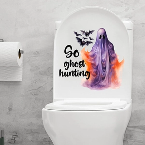 Halloween toilet sticker with purple ghost, black bats, and 'Go ghost hunting' text detail