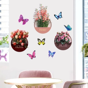 Self-adhesive wall stickers with green plants, flowers, and colorful butterflies