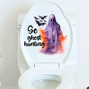 Self-adhesive Halloween toilet decal featuring a purple ghost and bats with Go ghost hunting text