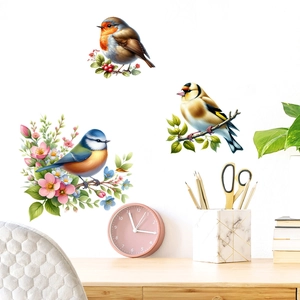 Detailed watercolor bird wall stickers with floral accents on a clean white wall