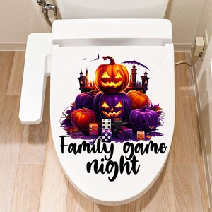 Detail of Halloween toilet sticker featuring pumpkins, a castle, and bats in a bathroom