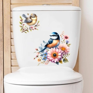 Waterproof floral bird wall sticker applied to a white ceramic toilet tank surface