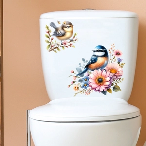 Waterproof wall sticker with colorful birds and flowers on a white toilet tank