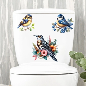 Detail of waterproof toilet tank stickers featuring colorful birds and floral branch designs