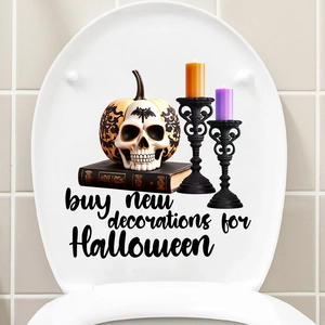 Close-up of Halloween decal with pumpkin skull and candles on toilet lid