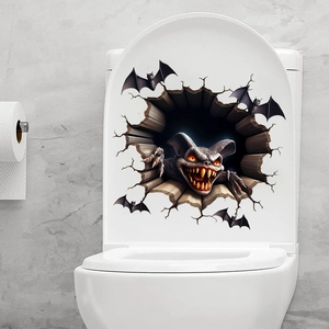 Macro view of 3D Halloween bat monster sticker with glowing eyes on white toilet lid