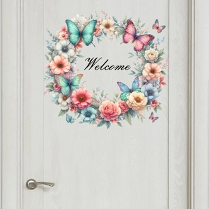Close-up of floral wreath wall sticker with butterfly accents and Welcome text on door