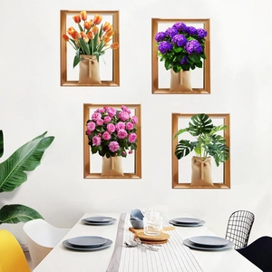 Détail de stickers muraux 3D 4 pièces avec tulipes, roses et monstera en cadres dorés