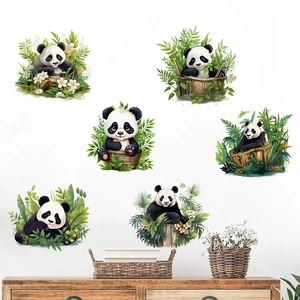 Set of six panda wall decals in a natural nursery room with bamboo and plant motifs