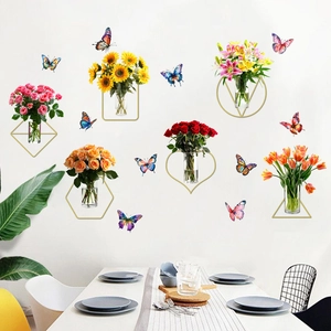 Detail of floral wall stickers featuring vases and butterflies in a home dining area