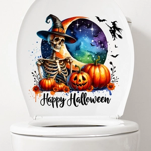 Detail of Halloween toilet lid decal with watercolor skull, pumpkin and moon motifs
