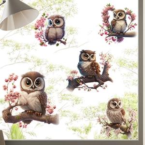 Self-adhesive wall decal with cartoon owl and cherry blossom branch for home decor