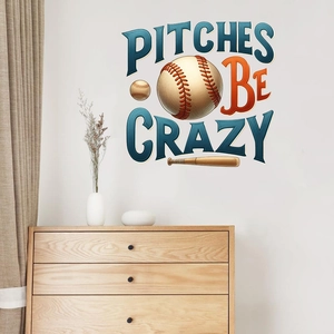 Baseball themed wall sticker with Pitches Be Crazy text above a wooden cabinet