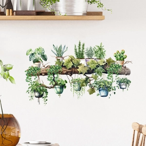 Detail of self-adhesive wall decals featuring realistic potted plants on a rustic wood beam