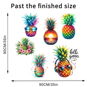 Detail view of colorful pineapple wall decals with tropical beach and summer flower themes