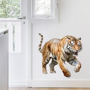 Detail of a realistic tiger wall sticker on a white wall in a modern living room