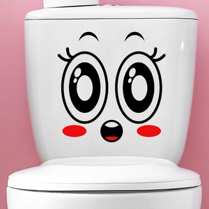 Funny cartoon smiley face wall sticker on white ceramic toilet tank with pink background